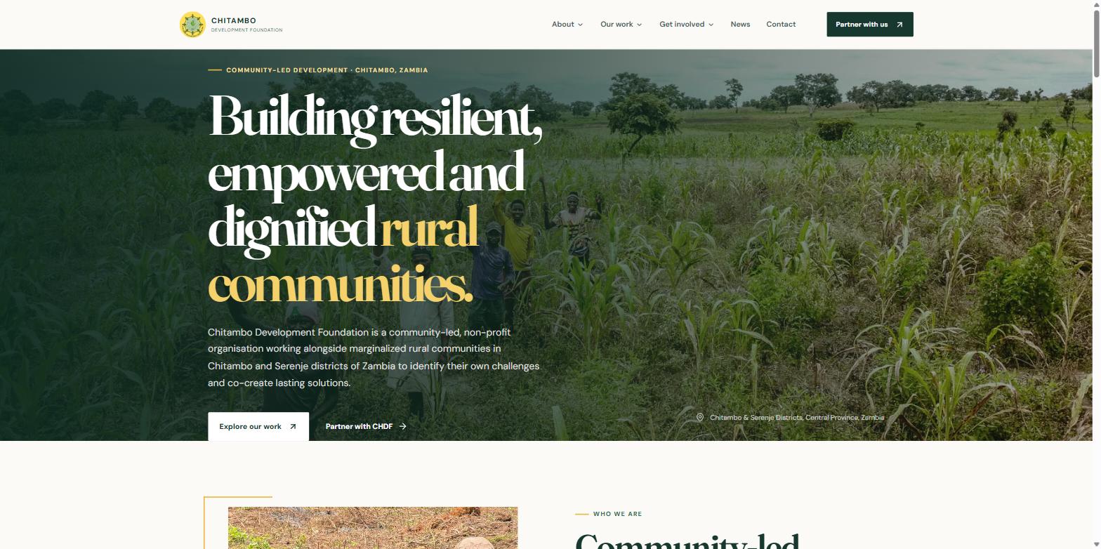 The Chitambo Development Foundation homepage, with a full-width photograph of a rural farming community behind the headline.