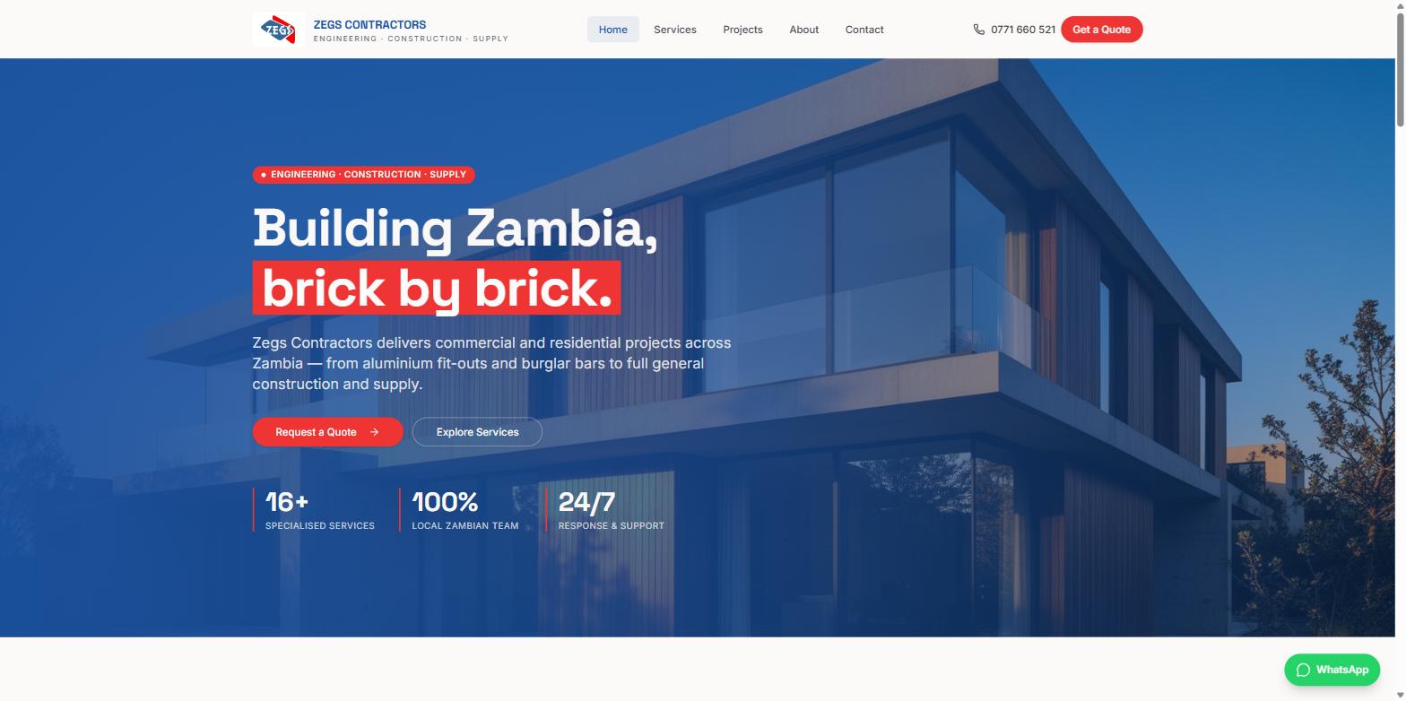 The Zegs Contractors homepage, a blue hero over a photo of a modern building with the headline Building Zambia, brick by brick.